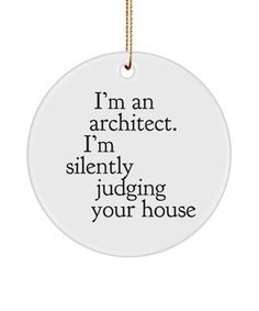 a white ornament with the words i'm an architet, i'm silently judging your house