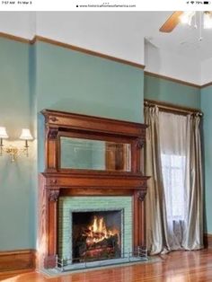 an empty living room with a fireplace in it