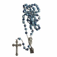 Blessed marble Light Blue Venetian style glass Rosary - Blessed by Pope Francis This is a beautiful item blessed by Papa Francesco (Pope Francis) during public blessing in St. Peter square. Attached to it there is a detailed and beautiful relic medal of St. Pio. It's a perfect rosary for a girl, a great present for Holy Communion. A colorful rosary that will stun you with its colors! Every 6 mm bead in this Rosary is different from the other. Every rosary is unique. Weight = 16 oz Length = 22" T Spiritual Blue Glass Beads, Blue Glass Spiritual Beads, Padre Pio Prayer, Marble Light, Blue Rosary, Stations Of The Cross, St Peter, Girl A, Rosary Catholic