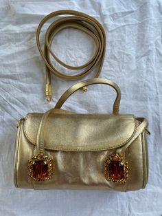 Vintage Authentic Dolce & Gabbana Evening Hand  bag Gold -Shoulder Bag Colour Gold Pattern uni One colour Gold Size Bags & Accessories / Mini Material Leather Made in Italy Condition Hervorragenden Zustand mit minimalen Gebrauchspuren Höhe 11 cm Breite 18 cm Tiefe 6 cm Accessories dabei : Quittung, Box  Style Party Luxury Gold Flap Bag With Detachable Strap, Designer Gold Flap Bag With Detachable Handle, Handheld Flap Bag With Dust Bag For Formal Occasions, Designer Gold Flap Bag For Formal Occasions, Designer Gold Shoulder Bag With Detachable Handle, Designer Gold Shoulder Bag With Adjustable Strap, Luxury Gold Crossbody Baguette Bag, Designer Gold Box Bag For Travel, Designer Evening Bag With Adjustable Strap