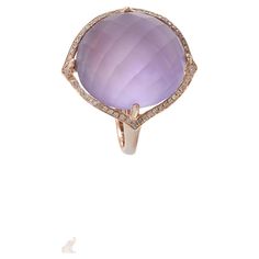 Estate Effy 14KT Rose Gold Faceted Cabochon Purple Amethyst and Diamond Cocktail Ring. This striking ring features a vibrant purple amethyst centerpiece, accented by 0.28 carats of round cut diamonds. Crafted from luxurious 14KT rose gold, it exudes elegance and sophistication, making it a perfect statement piece for any occasion. 9.80 grams. Size 7 US. Luxury Purple Rings With Rose Cut Diamonds, Luxury Elegant Faceted Amethyst Ring, Luxury Round Amethyst Ring With Rose Cut Diamonds, Luxury Rose Gold Oval Cabochon Jewelry, Gemstone Diamond Ring, Gold Tiger Eye, Tanzanite Diamond Ring, Amethyst And Diamond Ring, Diamond Cocktail Ring