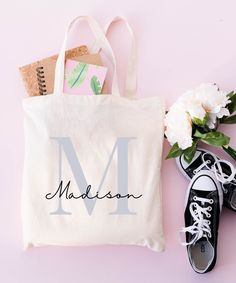 This 100% cotton bag comes in one size - 15" x 16"- perfect for everyday wear. The canvas material is durable and will last for years. The bag is easy to carry even with a week's worth of shopping. I can write everything you want on the tote bag.  ♥ PRODUCTION TIME: 1-5 days (Usually 2-3 days) ♥ SHIPPING TIME: 2-5 days (Usually 3 days) ♥ PRODUCT DESCRIPTION: - 100% cotton canvas - Available in natural and black colors - Heavy fabric  - Sewn-in label ♥ CARE INSTRUCTION: Do not iron directly over Customizable Cotton Canvas Shopping Bag, Personalized Cotton Canvas Bag For School, Personalized White Canvas Shopping Bag, Customizable Cotton Canvas Bag For Everyday Use, Personalized Cotton Canvas School Bag, Eco-friendly Cotton Canvas Bag For Personal Use, Personalized Rectangular Cotton Bags, Personalized Cotton Bags For Daily Use, Personalized White Cotton Canvas Bag