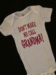 "A funny designed Onesies® features the phrase \"Don't Make Me Call Grandma\". Nothing matters more than a baby's comfort, and this one piece is the right choice for all active babies. The envelope neckline and three snap leg closure ensure comfort throughout the day. This is a perfect gift for Mom, Grandma, Baby Shower Gift or just because for that Little One! These gender neutral Gerber brand Onesies® are incredibly comfy! Both the bodysuits and t-shirts are printed on 100% cotton for a super Playful Short Sleeve Onesie With Funny Text, Family Matching Onesie With Funny Text For Birthday, Family Matching Birthday Onesie With Funny Text, Cute Onesie With Name Print For Playtime, Playful Onesie With Letter Print For Playtime, Funny Text Cotton Onesie For Birthday, White Onesie With Funny Text For Birthday, Cotton Onesie With Funny Text For Birthday, Birthday Cotton Onesie With Funny Text