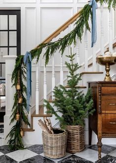 christmas decorations on the banisters and stairs