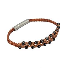 Embrace Bold Elegance with our Onyx Leather Bracelet, a perfect blend of natural strength and sleek style. This handcrafted bracelet features smooth, polished onyx beads set against a durable leather cord, creating a striking contrast that’s both modern and timeless. The deep black onyx exudes a sense of mystery and confidence, while the leather adds a rugged, natural touch. Ideal for everyday wear or as a standout accessory for special occasions, this bracelet offers versatility and effortless Modern Adjustable Black Beaded Jewelry, Brown Jewelry With Black Band For Everyday Wear, Elegant Adjustable Bracelets For Everyday Use, Modern Black Band Bracelet For Everyday Use, Modern Black Band Bracelets For Everyday Use, Adjustable Black Beaded Bracelets For Everyday, Elegant Leather Beaded Bracelets As Gift, Elegant Leather Beaded Bracelets With Adjustable Fit, Elegant Leather Beaded Bracelets