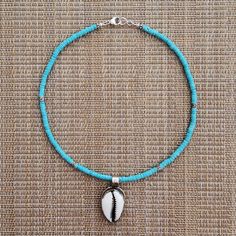 Turquoise Heishi Necklace (Stones 2x4mm) Accented 925 Silver Yin-Yang Bead (4.5mm) Shell Pendant Set In Brass Length = 16" (About 41 Cm) These Components Are 925 Silver--Lobster Clasp, Rings, 22g Wire, Beads Beads And Pendant Are Imported Designed And Made By Hand Coachella Valley, California, Usa Longer Lengths Or Extension Available Premium Quality Materials And Work No Dissapointments Turquoise Jewelry With Polished Beads For Beach, Turquoise Single Strand Jewelry For Beach, Turquoise Beaded Strand Jewelry, Turquoise Single Strand Jewelry For The Beach, Turquoise Shell Necklace With Round Beads, Hand-strung Heishi Beaded Necklaces For Beach, Handmade Turquoise Shell Necklace, Ocean-inspired, Hand-strung Spiritual Turquoise Necklace With Round Beads, Handmade Turquoise Shell-shaped Necklace