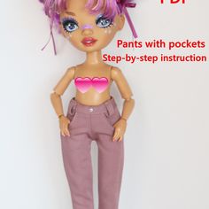 the doll is wearing pink pants with hearts on her chest