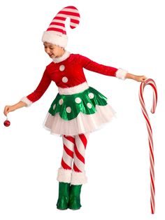 Your little angel will be channeling the magic of Christmas all holiday long when you pick up our Christmas Princess Candy Cane Elf Girls Costume! With your purchase, you will receive everything you need to turn your daughter into a gorgeous candy cane elf. Complete with a beautiful red and green dress, a red and white striped hat, a pair of matching candy cane leggings, and a pair of green boot covers, you can't go wrong with this look. Buy your candy cane princess costume today! Elf Princess, Christmas Elf Costume, Princess Halloween Costume, Elf Shoes, Elf Clothes, Elf Costume, Kids Candy, Elf Hat, Princess Costume