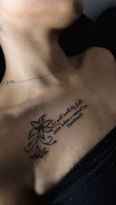 a woman with a tattoo on her chest that says, i will not be able to change