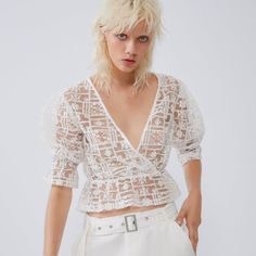 Zara Crop Top Chic White V-neck Embroidered Top, Chic Embroidered Lace Top For Spring, Elegant Short Sleeve Embroidered Top For Spring, Embroidered Lace V-neck Top, Elegant White Embroidered Short Sleeve Top, Chic Embroidered Zara Tops, Elegant Zara Tops With Floral Embroidery, Spring Floral Embroidered V-neck Lace Top, Spring V-neck Lace Top With Floral Embroidery