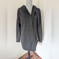 Cotton/ Poly Blend For A Comfy Sweatshirt. Open In The Front With No Closure. Charcoal With An Extra Soft White Interior. Oversized Fit With Two Large Side Pockets And Thumbholes For Warmth And Comfort. Super Cozy And Cute! New With Tags. Sporty Long Sleeve Loungewear Cardigan, Sporty Long Sleeve Cardigan For Loungewear, Gray Winter Workout Sweatshirt, Winter Workout Gray Sweatshirt, Gray Fall Workout Hoodie, Casual Gray Outerwear For Workout, Gray Athleisure Sweater For Fall, Gray Hooded Hoodie For Layering, Oversized Winter Workout Outerwear