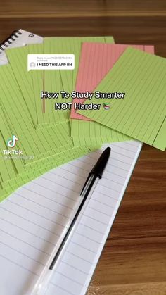 several sticky notes and a pen sitting on top of a notebook with the words how to study smarter not harder