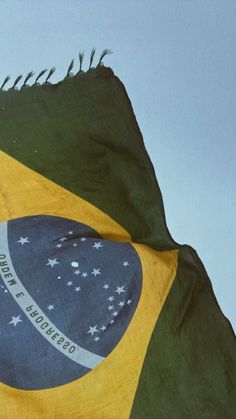 the flag of brazil is waving in the wind