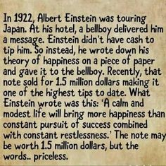 an old paper with writing on it that says in 1932, albert einstein was touring japan at his hotel, a bellboy delivered him