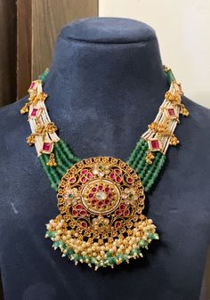 Festive Bollywood Chandbali Necklaces, Festive Chandbali Necklaces For Diwali, Traditional Stone Work Bridal Necklace For Eid, Bollywood Style Chandbali Necklace For Navratri, Navratri Chandbali Necklaces, Bollywood Chandbali Necklaces For Navratri, Navratri Festive Chandbali Necklaces, Kundan Jewelry For Navratri Ceremonial Events, Heavy Chandbali Bridal Necklace For Festivals