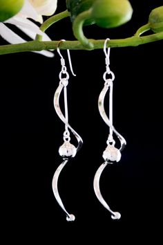 "* Stunning sterling silver drop earrings with wavy line design. * Drop is 3\". * Solid sterling silver * High quality look and feel. * Makes a great gift for loved ones." Elegant Swirl Earrings, Elegant Swirl Earrings As Gift, Elegant Swirl Earrings For Gift, Elegant Swirl Earrings With Ear Wire, Elegant Swirl Ear Wire Earrings, Elegant Spiral Sterling Silver Earrings, Elegant Sterling Silver Spiral Earrings, Earrings Long Silver, Long Silver Earrings