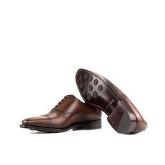 Characterized by its closed lacing style, the oxford is an elegant, classic, timeless style suitable for any occasion. The oxford is a staple shoe in any man’s wardrobe and can be dressed up or down. The Details: *Burnished Materials: med brown box calf Sole: brown goodyear leather sole + buttons rubber injections Last: Monti - Classic elegance with slightly square toe What is Fast Lane? Fast lane is our new experimental 7 day made to order collection, an ambitious never been heard of before col Men's Oxford Shoes, Brown City, Staple Shoes, Custom Made Shoes, Old Shoes, Leather Artisan, Oxford Shoes Men, Brown Box, Goodyear Welt