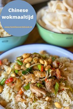 chinese wok maati id with rice and vegetables in blue bowl on wooden table