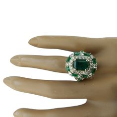 Stamped: 14K Total Ring Weight: 11.8 Grams Emerald Weight 3.20 Carat (9.00x7.00 Millimeters)Side Emerald Weight 2.00 CaratDiamond Weight: 1.70 carat (F-G Color, VS2-SI1 Clarity )Face Measures: 20.70x17.75 Millimeter SKU: [600419] Green Cluster Luxury Ring, Formal Emerald Cluster Ring With Accent Stones, Luxury Green Cluster Ring For Formal Occasions, Luxury Green Cluster Ring For Formal Events, Formal Green Diamond Ring With Accent Stones, Formal Green Gia Certified Cluster Ring, Formal Oval Green Cluster Ring, Formal Cluster Emerald Ring, Formal Green Gemstone Cluster Ring