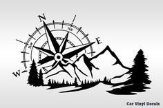 an image of a compass with mountains and trees in the background for vinyl decals