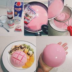 a person holding a pink object in front of a plate with food and utensils