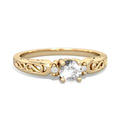 Elegant and exquisite, with an antique feel, this 14K Yellow Gold {shape} white topaz filligree ring is a classy choice for a classy woman. The filligree style was very popular in France from the 17th Century to the late 19th Century and here is a perfect example of why- the band on this ring is stunning, with a beautiful lacey, antique look. Luxury Classic Topaz Ring With Filigree, Elegant Filigree Diamond Ring, Elegant Filigree Ring With Rose Cut Diamonds For Anniversary, Elegant Birthstone Ring With Rose Cut Diamonds For Promise, Elegant 14k Gold Birthstone Ring With Rose Cut Diamonds, Classic Filigree Topaz Ring For Anniversary, Classic Gold Filigree Ring With Center Stone, Elegant Rose Cut Diamond Birthstone Promise Ring, Elegant Gold Birthstone Ring With Rose Cut Diamonds