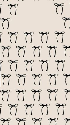 black and white bows on a beige background with the words,'bow ties'written below them