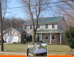 a two story house with a green roof