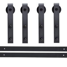 four black metal door handles and two brackets