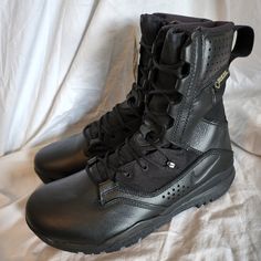 New With Tags, Only Tried On. Sold Out In This Size On Nike Site. Unisex, Men's Size 6.5, Fits Women's Size 8.5 (Only 1 Pair For Sale- Listed In Both Men's And Women's) Built For The Tactical Athlete. Made With Waterproof Fabric And Durable Leather, The Nike Sfb Field 2 8" Gore-Tex Is A Lightweight Yet High-Performance Boot Designed To Support Heavier Loads In All Theaters. The Sole Is Equipped With An Aggressive Tread Pattern That Provides Exceptional Traction Over Challenging Terrain, While An Nike Lace-up Combat Boots For Outdoor, Black Impact Resistant Boots For Streetwear, Black Impact-resistant Boots For Streetwear, Nike Black Boots For Outdoor Work, Functional Black Lace-up Combat Boots, Combat Style Waterproof Boots With Abrasion-resistant Round Toe, Durable Black Hiking Boots, Abrasion-resistant Round Toe Combat Boots, Waterproof Abrasion-resistant Boots For Streetwear