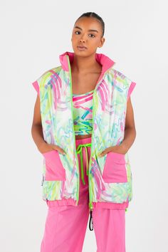 Glow with confidence in this season’s hottest fashion piece—the Highlighter Sleeveless Puffer Jacket in Flower Pink. This is the new street style essential. Created with you in mind, this piece is reversible—barbie core pink on the front and our abstract watercolor print on the reverse side. Two wears in one, what more can you ask? Trendy Multicolor Vest For Spring, Trendy Pink Vest For Spring, Trendy Nylon Spring Vest, Trendy Nylon Vest For Spring, Trendy Spring Nylon Vest, Summer Sleeveless Outerwear For Streetwear, Sleeveless Summer Outerwear For Streetwear, Sleeveless Outerwear For Summer Streetwear, Trendy Streetwear Vest For Spring