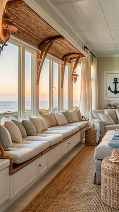 a living room filled with lots of furniture next to a window covered in wicker