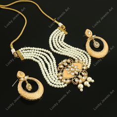 This is a stunning handmade necklace perfect for high end Jewelry Collector, a keeper in Traditional Vintage Indian/Pakistani Bridal jewelry and a Luxury Gift for your Daughter, Sister or Wife on Wedding or Anniversary. Perfect for any type of occasions, weddings And celebrations and a beautiful & memorable gift for weddings and special occasions. Description  Item Code:- L Gold Plated Peach Meenakari Chik Necklace Set Necklace Measures- Adjustable with a Dori/Cord Earring Measures- 52x40mm approx Quantity- One Necklace Set Please see more different designs here:- https://www.etsy.com/in-en/shop/LUCKYJEWELSART?ref=seller-platform-mcnav I make every item of my collection with a lot of love and care, I pay attention to every detail.  You are more than welcome to contact me for any question y Luxury Gold Plated Kundan Necklace, Luxury Meenakari Designer Necklaces, Luxury White Meenakari Necklace, Luxury Gold-plated Kundan Necklace Gift, Layer Pearl Necklace, Traditional Wedding Jewellery, Pakistani Bridal Jewelry, Layered Pearl Necklace, Necklace Trendy