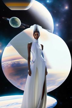 a woman in a white dress standing next to an image of saturn and the moon