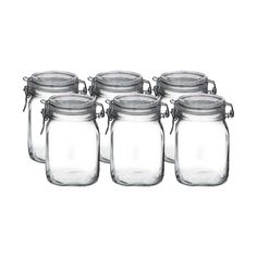 six glass jars with metal handles and lids