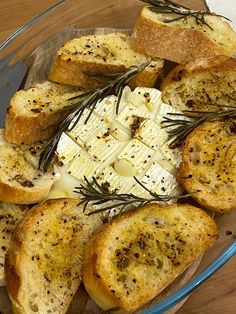 bread with cheese and herbs in a glass bowl