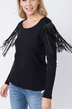 Vocal Casual ribbed long sleeve top with studded suede fringe drape on shoulders. Boho, festival, basic. Stunning detail. Color: Black Sizes: S-M-L-XLBust flat 32-34-36-38, fabric is stretchy, Length 25 100% Cotton, Made in USA X/18570L Chic Fringe Tops For Fall, Trendy Fringe Tops For Winter, Winter Long Sleeve Tops With Tassels, Trendy Fringe Tops For Night Out, Chic Long Sleeve Fringe Tops, Chic Long Sleeve Tops With Fringe, Fitted Tassel Tops For Fall, Long Sleeve Tops With Tassels For Fall, Fringe Tops For Fall Party