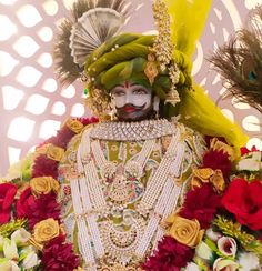 a man dressed in elaborately decorated clothing