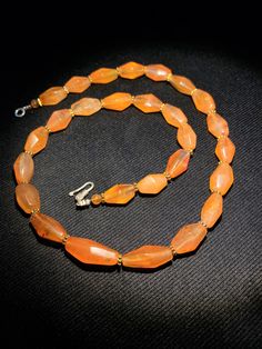 The beautiful orange color carnelian beads mala necklace very smooth and shinny surface because of long passage of times using in prayer mala and in necklaces some gold color brass beads are used as spacers we provide fast and free shipping service world wide Carnelian Agate, Beads Mala, Green Jasper, Brass Beads, Jasper Necklace, Carnelian Beads, Mala Necklace, Color Vintage, Banded Agate