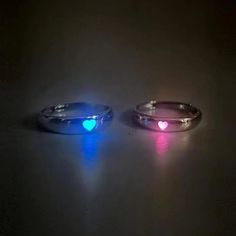 INCLUDES: (1) Pair Glow in the Dark Adjustable Matching Rings for Couples - or - (1) Glow in the Dark Adjustable Matching Rings for Couples SPECIFICATIONS: Metal: Zinc Alloy Color: Silver Size: About 1.8 cm inner diameter before adjustment (opening adjustable) DESCRIPTION: Ignite the magic of your connection with these Glow in the Dark Adjustable Matching Rings for Couples. Crafted with love and luminosity, these rings offer a unique and enchanting way to symbolize your bond. Made from high-qual Couple Rings Silver, خواتم خطوبة, Dark Rings, Romantic Rings, Light Jewelry, Ring Man, Versatile Jewelry, Adjustable Jewelry, Couple Jewelry