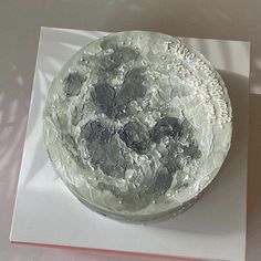 there is a cake that has been decorated with rocks