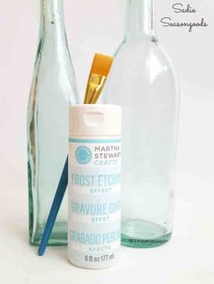 a bottle with a toothbrush and some other items in it