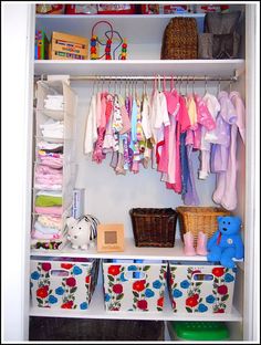 an organized closet with clothes, toys and other items on it's shelves in a child's room