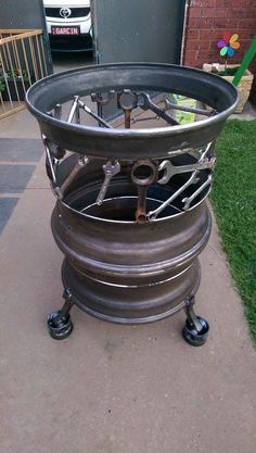 a large metal object sitting on top of a sidewalk