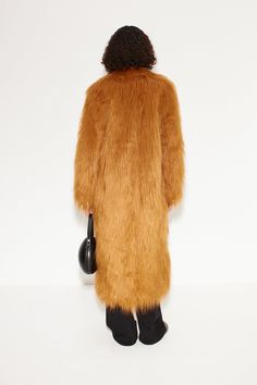 Lush faux fur coat with notched lapels and side seam pockets. Details Model: W824-3214-96385 FAUX FUR (SHELL): 100% MODACRYLIC LINING: 100% POLYESTER Imported DRY CLEAN ONLY. Sizing Shelby is 5'10" and wears a size XS Bust: 30" Waist: 24" Hip: 35" Shaggy Faux Fur Coat, Pockets Details, Fall Wardrobe Essentials, Flat Heel Boots, Denim Hat, Kids Outerwear, Baby Boy Shoes, Sports Blazer, Boy Shoes