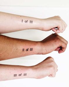 two arm tattoos with roman numerals on them