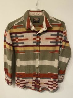 Pendleton Portland Collection wool jacket Shirt small Made In USA Aztec Pattern. Condition is "Pre-owned". Excellent shape - no flaws. No size or fabric tag but measures to a size small and is obviously the classic virgin wool construct. Chest: 20” pit to pit Stomach: 16.5” - a more narrow tapered fit at stomach Length: 27.5” Sleeve length: 31” Please look carefully at both stock and actual photos before making a purchase. Please read the description and review photos carefully to avoid incorrec Long Sleeve Wool Shirt For Fall, Wool Long Sleeve Shirt For Fall, Casual Long Sleeve Wool Shirt, Retro Long Sleeve Winter Shirt, Vintage Long Sleeve Winter Shirt, Vintage Wool Long Sleeve Tops, Vintage Long Sleeve Wool Top, Pendleton Pattern, Jacket Shirt