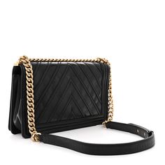 This is an authentic CHANEL Calfskin Caviar Suede Chevron New Medium Boy Flap in Black. This chic shoulder bag is crafted of calfskin, caviar, and suede leather in black. The bag features a chevron print with contrasting leathers and a linear trim in smooth calfskin. It has a matte gold chain shoulder strap with a leather shoulder pad and a matte gold CC boy push lock. This opens to a burgundy fabric interior with a zipper and flat pockets. Cc Card, Chanel Crossbody, Coco Handle, Burgundy Fabric, Chanel Tweed, Chanel Shoulder Bag, Chanel Caviar, Chevron Print, Black Cross Body Bag