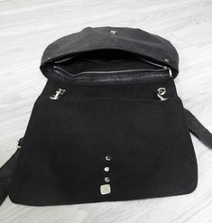 "A great shoulder bag in glam rock / vintage style, made of a luxurious version of Alcantara suede - a thick fabric with excellent usability parameters - resistant to dirt and abrasion. This suede is \"aged\", in places shimmering, black dappled. The inside of the bag also with Alcantara. The whole is closed on the zipper. The whole purse is stiffened and strengthened with the insulation - keeps the cut without filling. The belt is 3cm wide, adjustable. The bag will accommodate all necessary fem Alternative Leather Bag With Zipper Closure, Vintage Black Satchel With Zipper Closure, Grunge Bags With Adjustable Strap For Alternative Fashion, Alternative Style Leather Shoulder Bag With Zipper, Edgy Leather Bags For Concerts, Black Grunge Shoulder Bag For Concerts, Leather Bags With Zipper Closure For Concerts, Alternative Leather Bags With Adjustable Strap, Alternative Leather Bag With Adjustable Strap