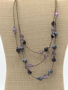 Multi strand purple beads necklace by Lia Sophia Purple Beaded Chain Necklace With Round Beads, Elegant Purple Beads For Party, Elegant Multi-strand Purple Beaded Necklaces, Elegant Purple Multi-strand Beaded Necklaces, Purple Beaded Necklace With Round Black Beads, Purple Polished Beads For Party, Polished Purple Beads For Party, Elegant Purple Beaded Necklace With Round Beads, Polished Purple Party Beads